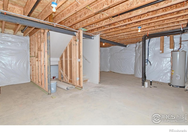 unfinished basement with water heater