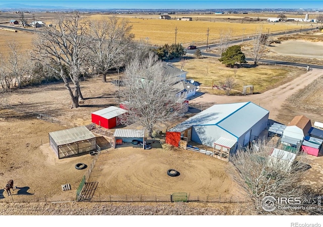 bird's eye view with a desert view and a rural view