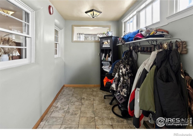 mudroom featuring baseboards