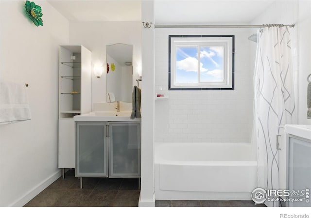 full bathroom featuring tile patterned floors, shower / bathtub combination with curtain, baseboards, and vanity