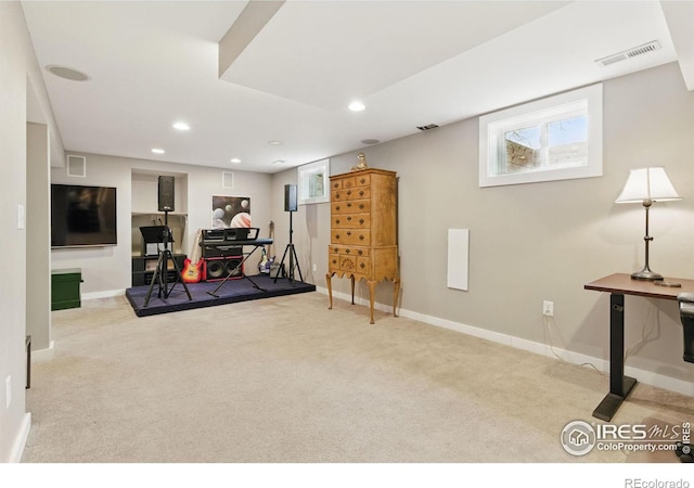 workout area featuring carpet, visible vents, and recessed lighting