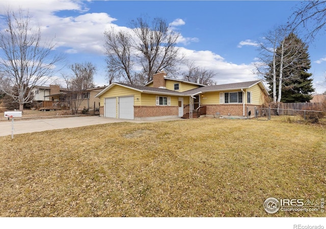 view of front of house featuring an attached garage, brick siding, fence, concrete driveway, and a front yard