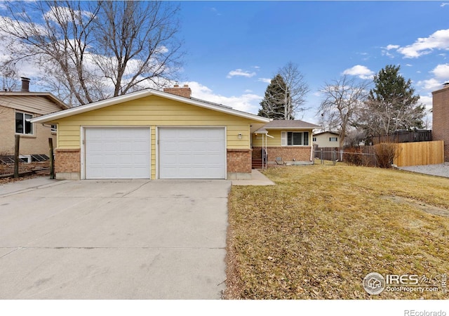 ranch-style house featuring a garage, brick siding, fence, and a front lawn