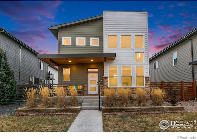 modern home with fence