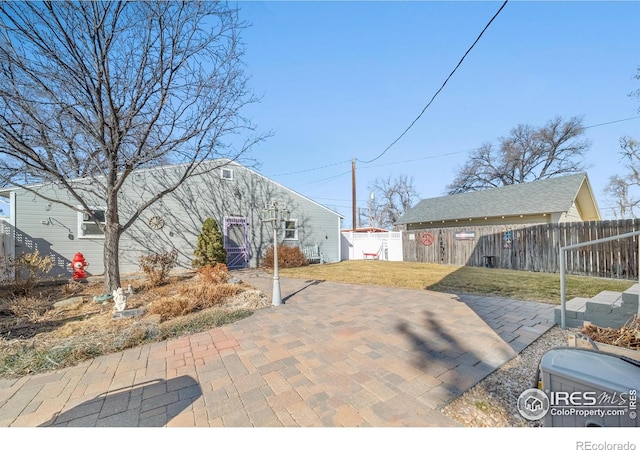 view of patio / terrace with fence