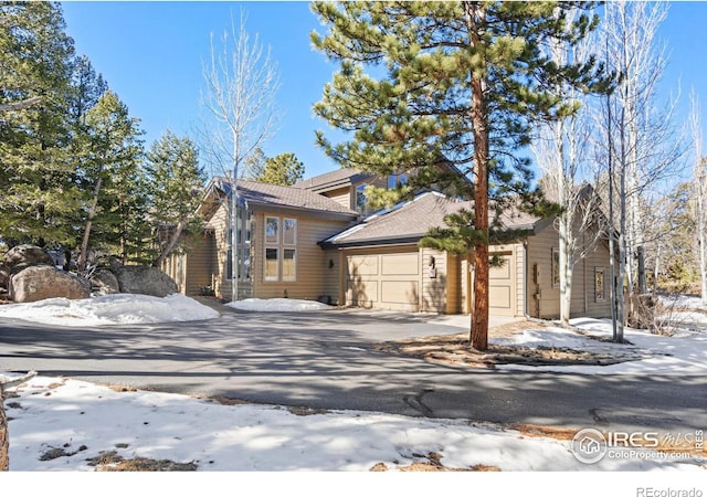 view of front of house featuring driveway and an attached garage