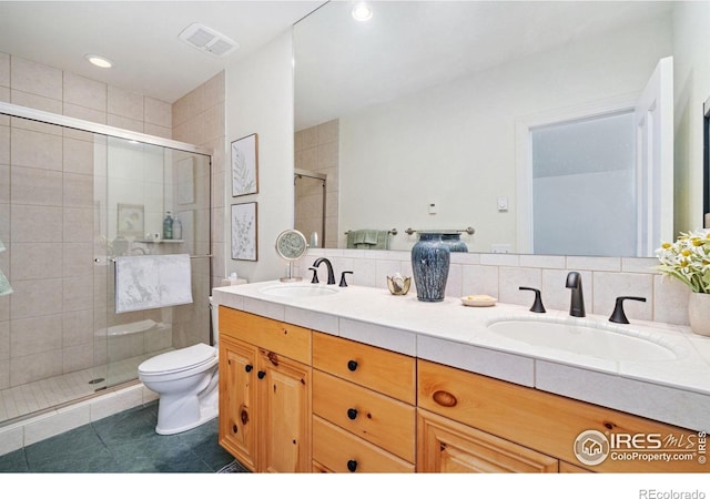 full bathroom featuring a shower stall, visible vents, decorative backsplash, and a sink