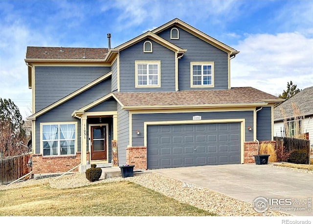 view of front of property with driveway, a shingled roof, an attached garage, fence, and brick siding