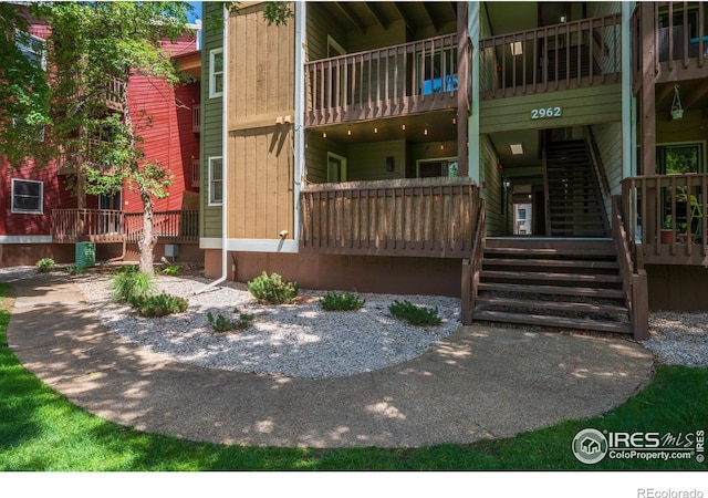 view of property with stairway