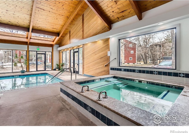 pool with an indoor hot tub