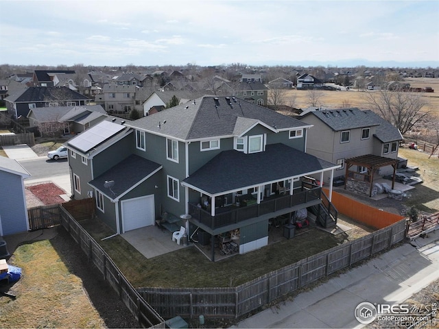 drone / aerial view with a residential view