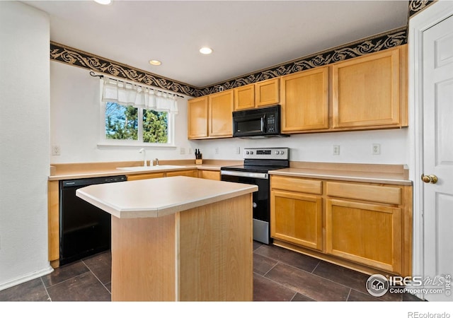 kitchen featuring a center island, light countertops, black appliances, a sink, and recessed lighting