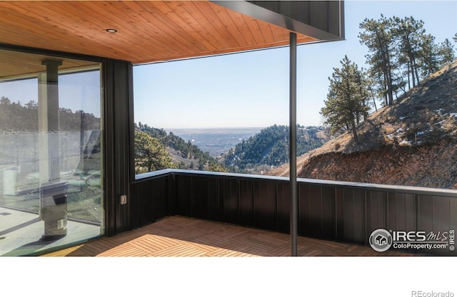 interior space featuring wood ceiling