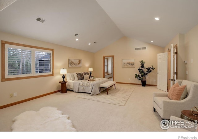 carpeted bedroom with visible vents, vaulted ceiling, and baseboards