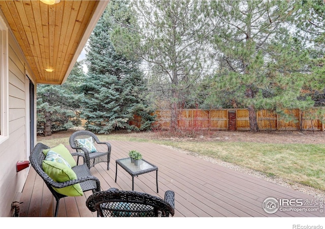 deck with fence and outdoor lounge area