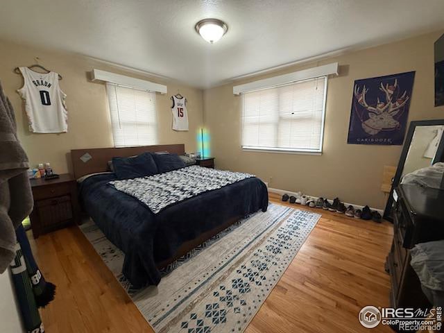 606 Sheldon Dr, Fort Collins, CO 80521 - bedroom featuring wood finished floors