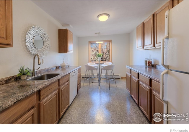 2425 Waneka Lake Trl, Lafayette, CO 80026 - kitchen featuring white appliances, a sink, a baseboard radiator, brown cabinets, and pendant lighting