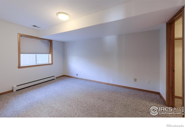 2425 Waneka Lake Trl, Lafayette, CO 80026 - empty room featuring a baseboard heating unit, carpet, and baseboards