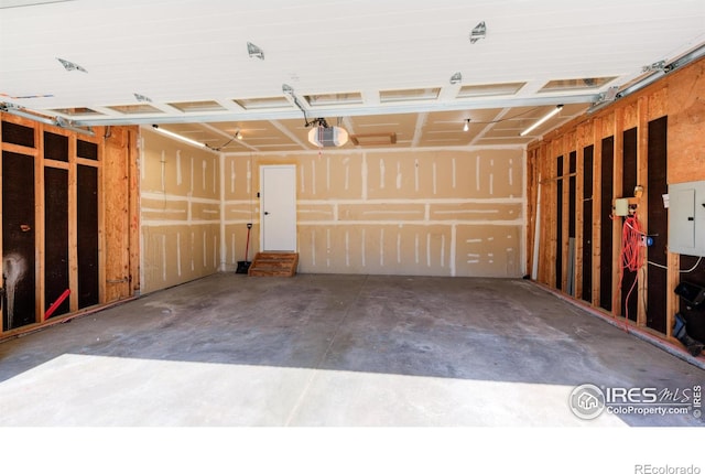 2425 Waneka Lake Trl, Lafayette, CO 80026 - garage featuring electric panel and a garage door opener