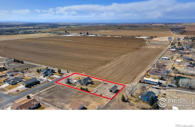 birds eye view of property featuring a rural view