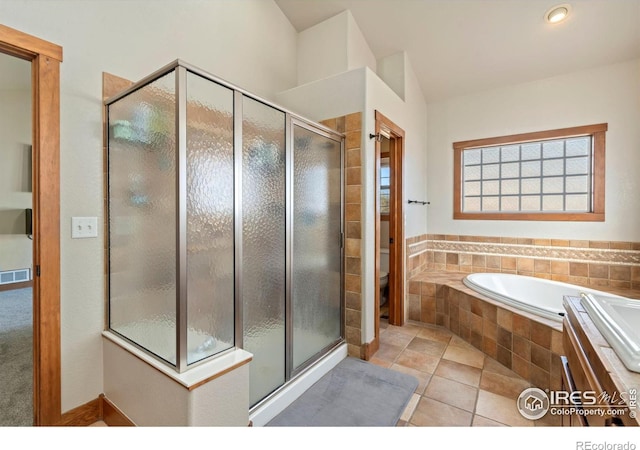 full bath featuring tile patterned flooring, toilet, a garden tub, visible vents, and a stall shower