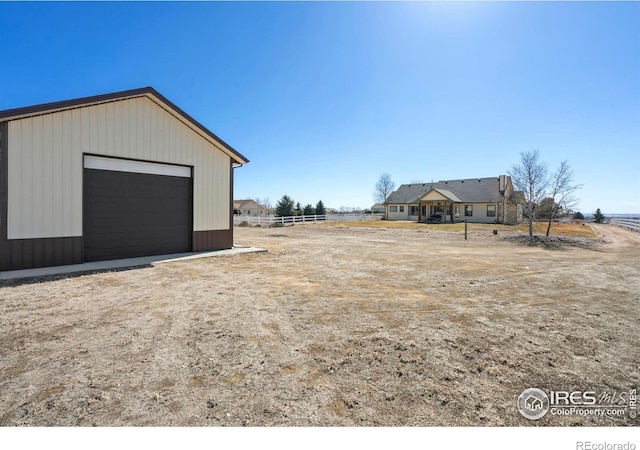 view of yard with an outbuilding