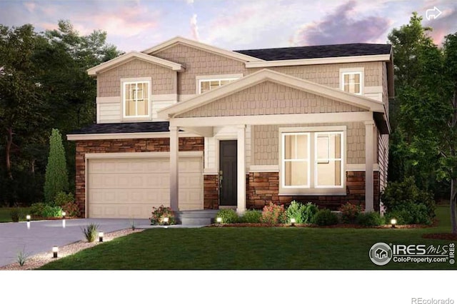 craftsman-style house featuring a garage, stone siding, a lawn, and concrete driveway