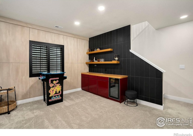 bar with recessed lighting, visible vents, baseboards, and light colored carpet