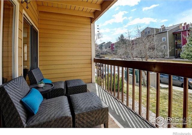 balcony featuring a residential view