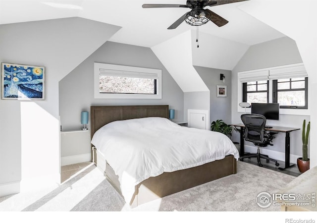 bedroom with vaulted ceiling, baseboards, and ceiling fan