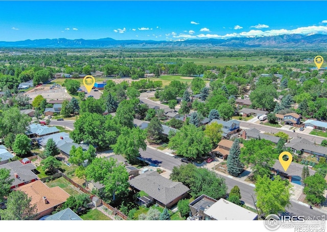 bird's eye view with a residential view and a mountain view