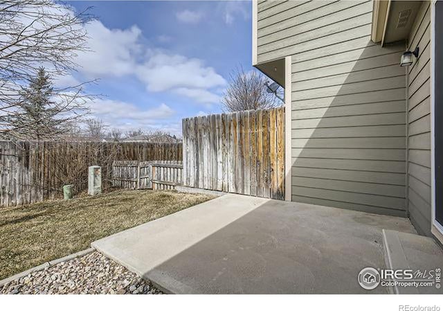 view of patio with fence