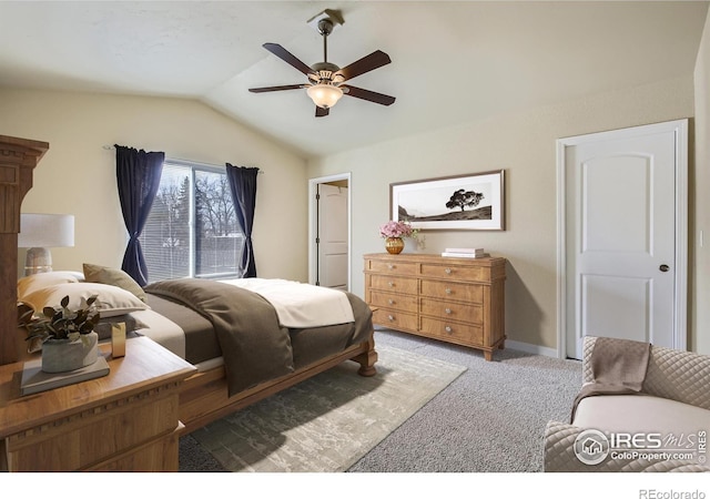 bedroom with baseboards, lofted ceiling, a ceiling fan, and carpet flooring