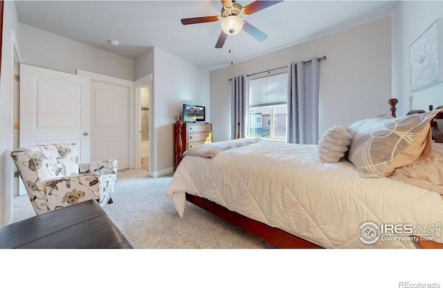 bedroom with light carpet and ceiling fan