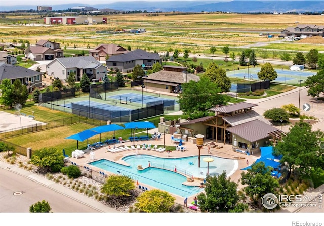 birds eye view of property featuring a residential view and a mountain view