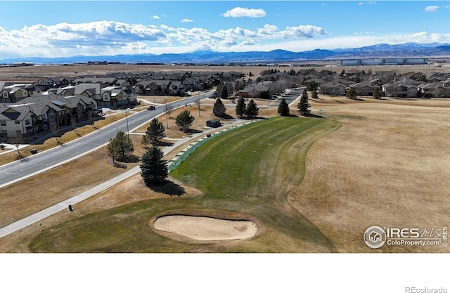 bird's eye view featuring a residential view and a mountain view