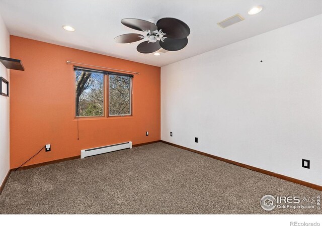 carpeted spare room featuring recessed lighting, visible vents, a baseboard heating unit, a ceiling fan, and baseboards