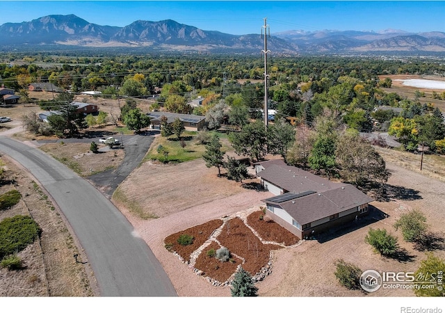 drone / aerial view featuring a mountain view