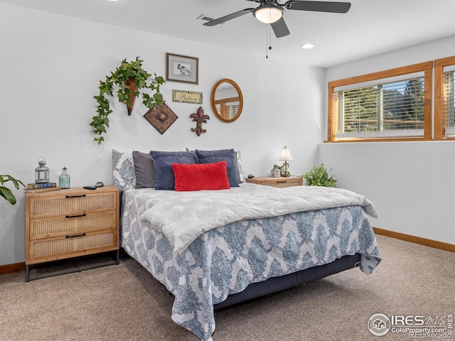 carpeted bedroom featuring baseboards, a ceiling fan, and recessed lighting