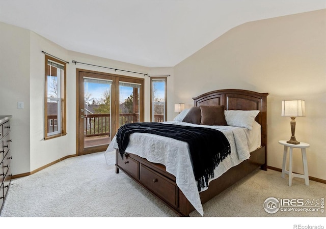 bedroom featuring lofted ceiling, baseboards, light colored carpet, and access to exterior