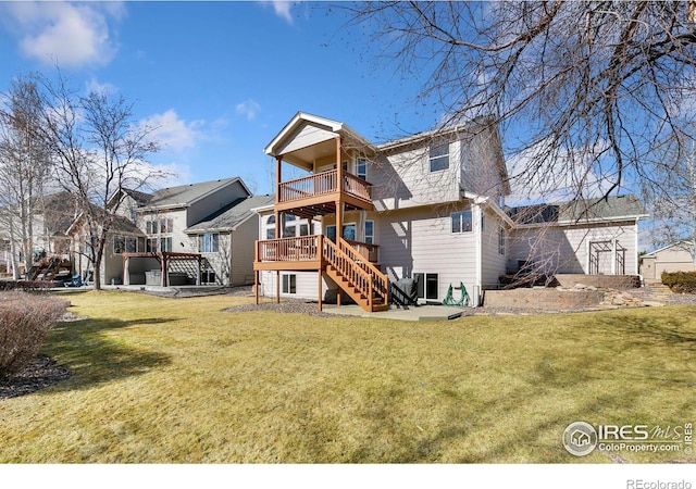 rear view of property with stairs, a yard, a deck, and a patio