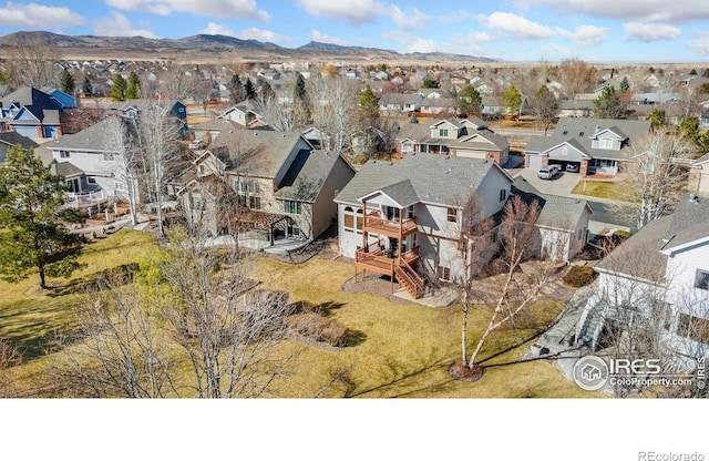 aerial view with a residential view and a mountain view