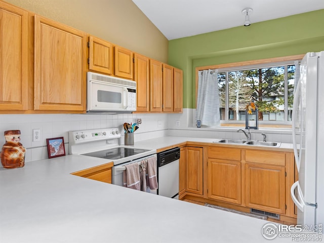 kitchen featuring white appliances, a sink, visible vents, light countertops, and backsplash