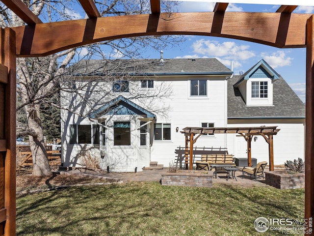 rear view of house with roof with shingles, a lawn, a pergola, and a patio