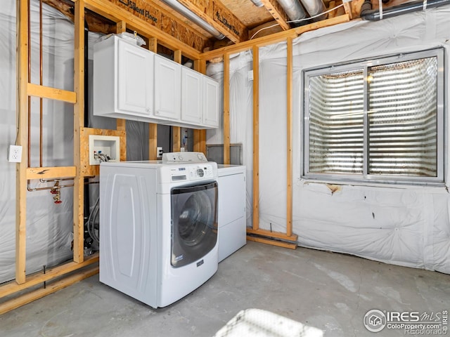 laundry area with washer and dryer and cabinet space