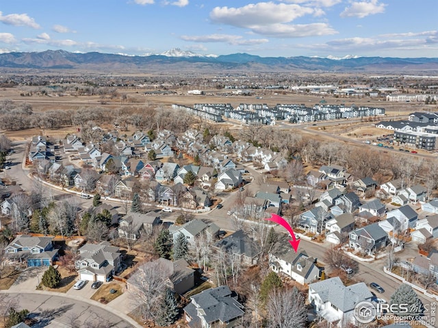 bird's eye view with a mountain view and a residential view