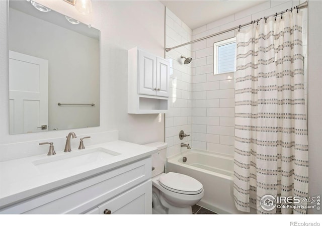 full bath featuring vanity, shower / tub combo, and toilet