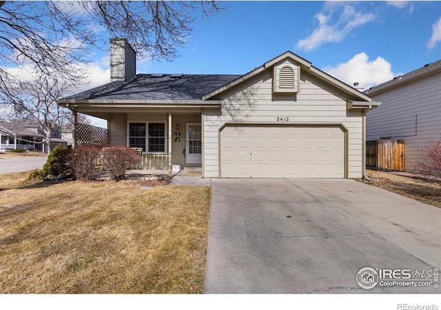 ranch-style home with concrete driveway, a chimney, an attached garage, covered porch, and a front lawn