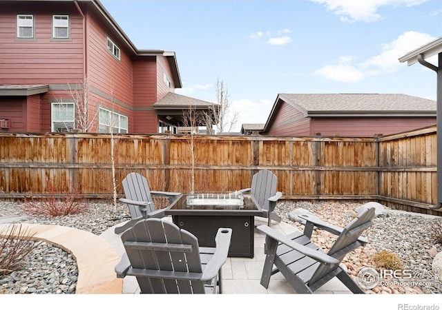 view of patio / terrace featuring fence