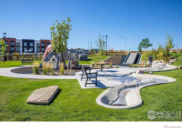 view of jungle gym featuring a yard